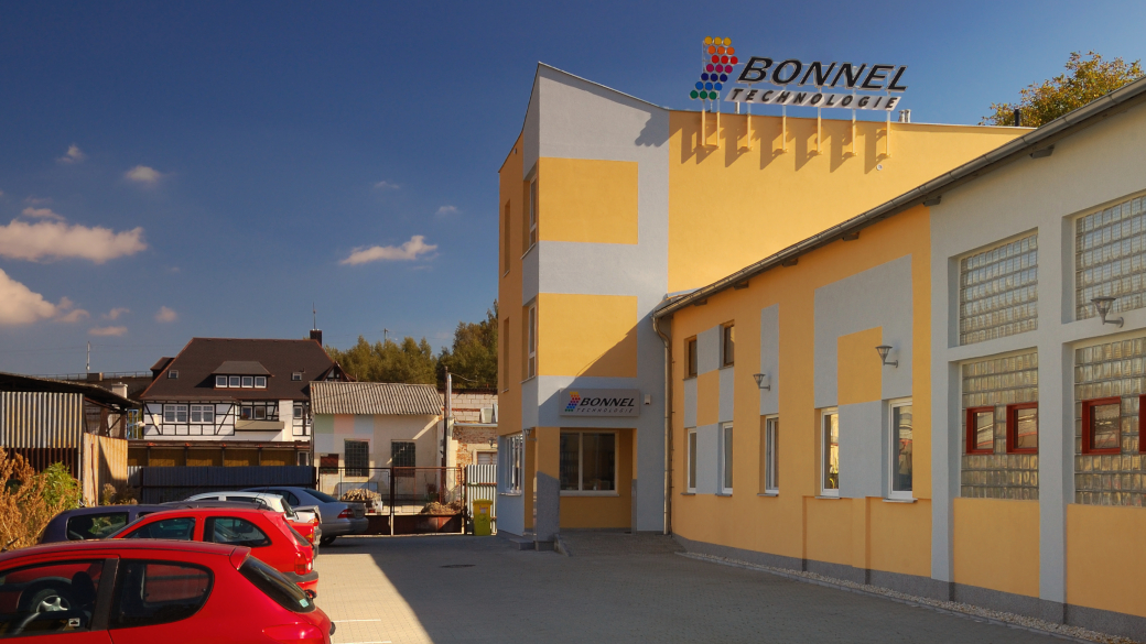 Office Building with Productionhall and Parking Lot